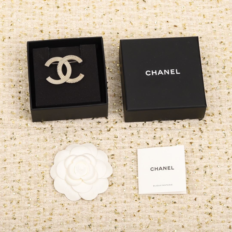 Ch**el brooches